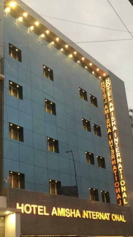 Hotel Amisha International Сурат Экстерьер фото